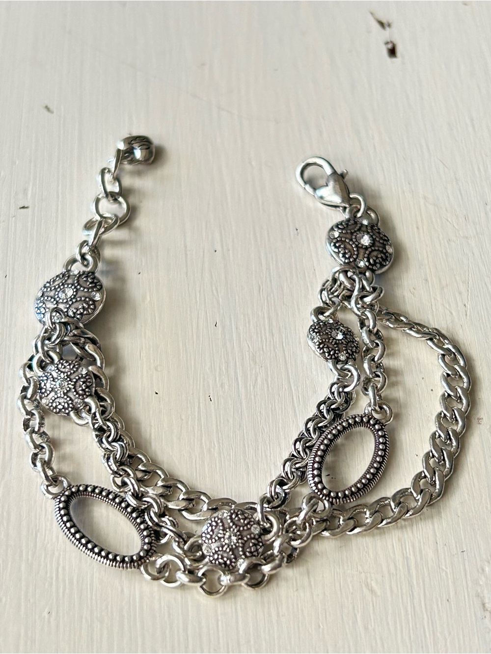 Brighton Fifth Ave triple-strand bracelet w/filigree links & clear crystals